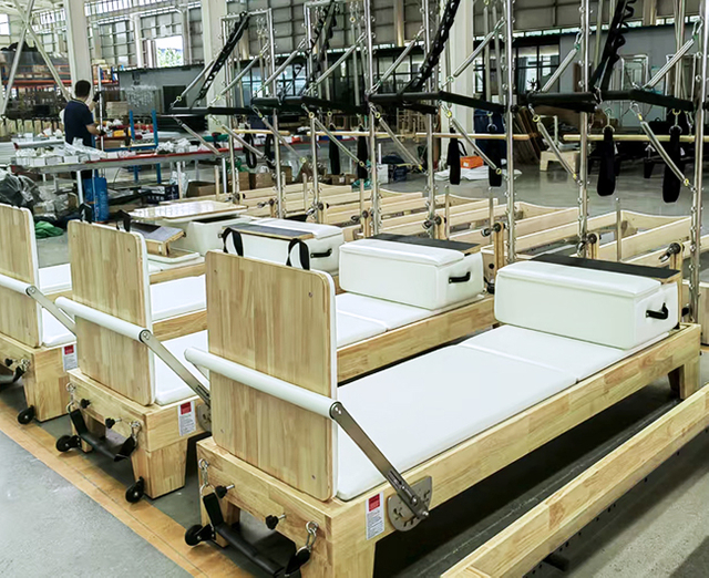 Factory machinery used in Pilates reformer manufacturing